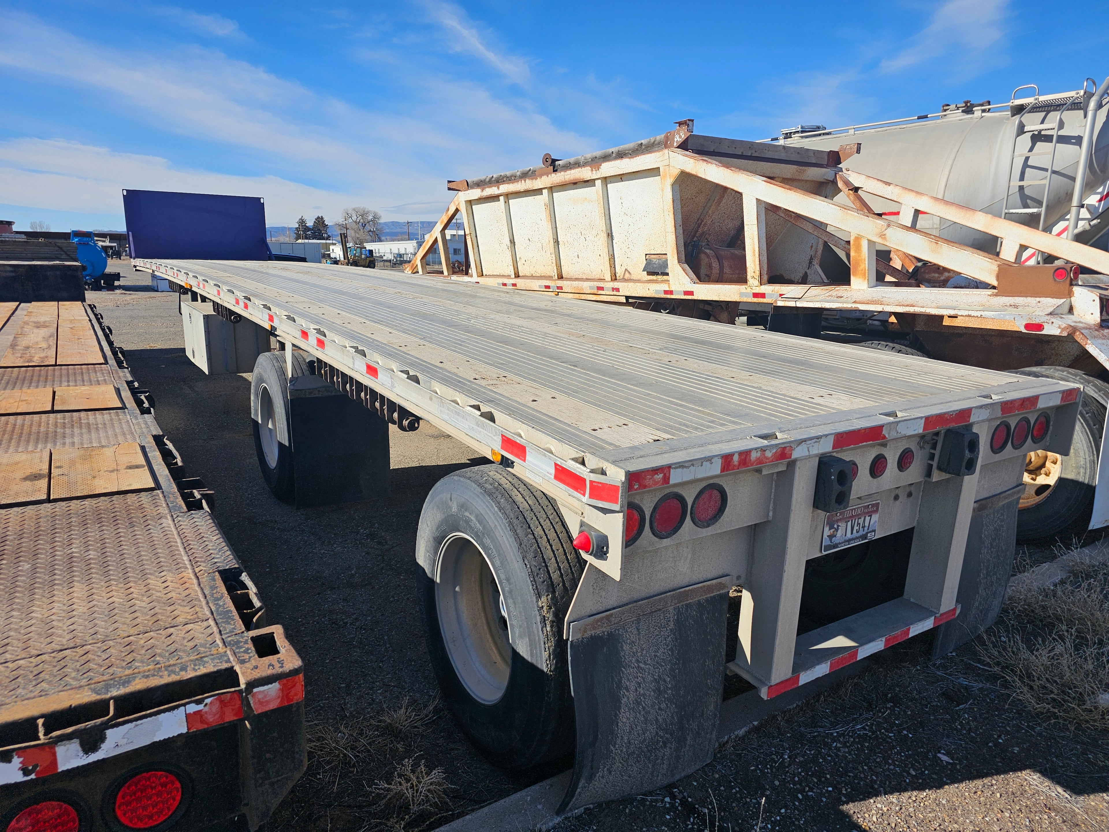 1999 Raven 48' Spread Axle Flat Bed
